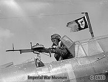 Airplane Picture - The sergeant air gunner of a Battle mans the aircraft's defensive weapon, a single pintle-mounted rapid firing Vickers K machine gun, France 1940