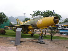 Airplane Picture - A J-7 in yellow camouflage colors