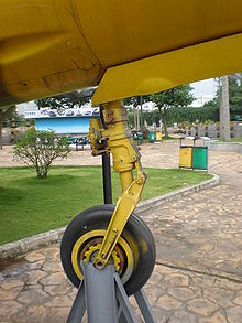 Airplane Picture - The front landing gear of the yellow J-7