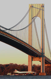 Aircraft Picture - Concorde G-BOAD on a barge beneath the Verrazano Narrows Bridge in New York City in November 2003, bound for the Intrepid Sea-Air-Space Museum