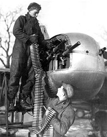 Aircraft Picture - Re-loading machine guns on an A-26B with a six-gun nose