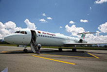 Aircraft Picture - An Air Niugini Fokker 100 (P2-ANH) parked at Mt. Hagen's Kagamuga Airport, Papua New Guinea.