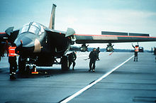 Aircraft Picture - Ground crew prepares an F-111F of the 48th Tactical Fighter Wing for a retaliatory air strike on Libya.