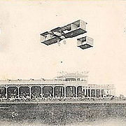 Aviation History - Raymonde de Laroche - Raymonde de Laroche in flight in her Voisin biplane at the Reims airshow in 1910