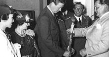 Aviation History - Hermann Gxring presents Lindbergh with a medal on behalf of Adolf Hitler; Anne Lindbergh is far left. Photo taken on July 28, 1936.