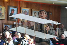 Aviation History - The Wright Brothers - Park Ranger Tom White demonstrates a replica of the Wright brothers 1899 box kite at the Wright Brothers Memorial