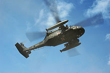 Helicopter Picture - US Army UH-60A MEDEVAC evacuating simulated casualties during a training exercise