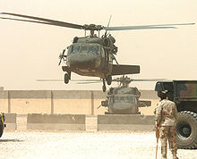 Helicopter Picture - UH-60s equipped with M60 machine guns near An Najaf, Iraq in May 2005.