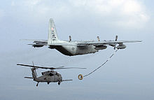 Helicopter Picture - USAF HC-130P of the 920th Rescue Wing refuels an HH-60 Pave Hawk.