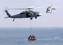 Helicopter Picture - An MH-60S Knighthawk conducts VERTREP