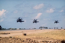 Helicopter Picture - UH-60A Black Hawks over Port Salinas during the invasion of Grenada, 1983. The conflict saw the first use of the UH-60.