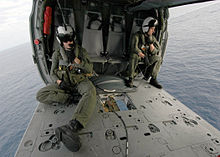 Helicopter Picture - MH-60S empty cabin and sling load mechanism.