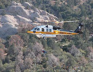 Helicopter Picture - Los Angeles County Fire Department S-70A Firehawk rescuing an injured hiker at Devil's Punchbowl near Palmdale, California