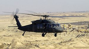 Helicopter Picture - A UH-60L Black Hawk flies a low-level mission over Iraq in 2004.