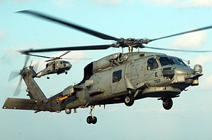 Helicopter Picture - U.S. Navy SH-60B preparing to land on USS Kitty Hawk.
