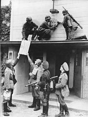 World War 1 Picture - German troops remove Polish insignia at the Polish-Danzig border near Zoppot on 1 September 1939