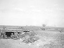 World War 1 Picture - British 18-pounder battery under German fire close to Monchy-le-Preux, 24th April. In the foreground is an advanced dressing station