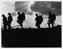 World War 1 Picture - British soldiers moving forward during the Battle of Broodseinde. Photo by Ernest Brooks.