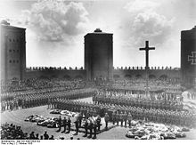 World War 1 Picture - Hindenburg's original 1934 burial at the Tannenberg Memorial. Hitler is speaking at the lectern.