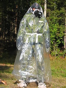 World War 1 Picture - A Swedish Army soldier wearing a chemical agent protective suit (C-vxtskeskydd) and protection mask (skyddsmask 90).