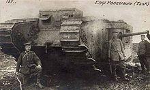 World War 1 Picture - German troops with British tank captured 11th April near Bullecourt