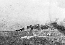 World War 1 Picture - HMS Indefatigable sinking after being struck by shells from the German battlecruiser Von der Tann