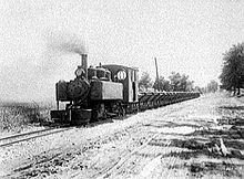 World War 1 Picture - One of the military 2-6-2T pulling 4-wheel side dump cars for a Michigan construction project in 1921.