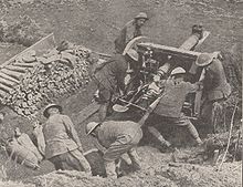 World War 1 Picture - 18 pounder gun crew in action during the advance near Athies