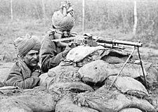 World War 1 Picture - A Benet-Mercier machine gun section of 2nd Rajput Light Infantry of British Indian Army in action in Flanders, during the winter of 1914-15.