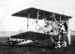 World War 1 Picture - Cobby in his Sopwith Camel while instructing in England, c. 1918-19. He organised the high-visibility check paint pattern himself, 'not for conceit, but for safety'.[4]