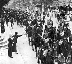 World War 1 Picture - French heavy cavalry, wearing armoured breastplate and helmet, parade through Paris on the way to battle, August 1914.