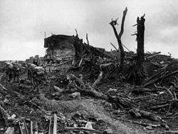 World War 1 Picture - The Gibraltar bunker, Pozieres, in late August. A fatigue party laden with sandbags heads for the fighting at Mouquet Farm.