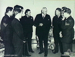 World War 1 Picture - Major General Sir William Glasgow, Australia's High Commissioner to Canada, speaks with aircrew of the British Commonwealth Air Training Scheme in the Anzac club.