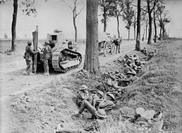 World War 1 Picture - Canadian troops shelter in a ditch along the Arras-Cambrai road.