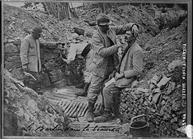 World War 1 Picture - A barber in a French trench