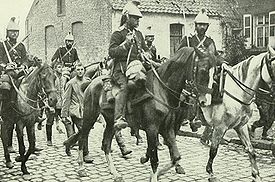 World War 1 Picture - French cavalry marching German prisoners