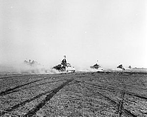 World War 1 Picture - British tanks advancing under fire at the Second Battle of El Alamein during World War II.