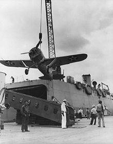 World War 1 Picture - VMF-211 F2A-3 being shipped to Midway, in early 1942.