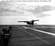 Airplane Picture - USMC OY-2 takes off from the USS Sicily, 1950.