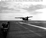 Airplane Picture - USMC OY-2 takes off from the USS Sicily, 1950.