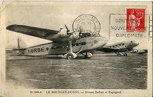 Airplane Picture - Paris-Le Bourget Airport in 1935. I-URBE (in the foreground) is an S.74; the other aircraft is a Douglas DC-2 airliner operated by the Spanish airline LAPE (Lineas Areas Postales Espaxolas).