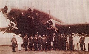 Airplane Picture - Japanese officials pose with the SM.75 GA RT and its crew during its July 1942 visit to East Asia.