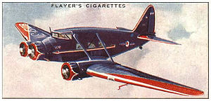 Airplane Picture - Stinson Model A in American Airlines colours from a cigarette card by Players, 1936
