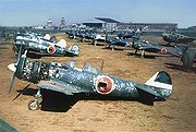 Warbird Picture - Ki-84s and Ki-43s photographed on a JAAF base in Korea post-war. The Ki-84 in the foreground is from the 85th Hiko-Sentai, the next one in line belonged to the 22nd Hiko-Sentai HQ Chutai