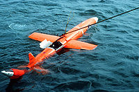 Airplane Picture - MQM-74C Chukar II floating and being recovered.