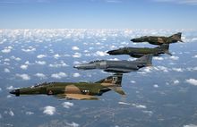 Airplane Picture - A formation of F-4 Phantom IIs fly during a heritage flight demonstration to commemorate the 50th Anniversary of the U.S. Air Force.