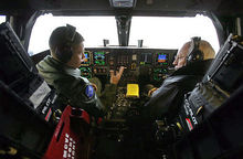 Airplane Picture - Vice President Dick Cheney sits inside the cockpit of a B-2 with pilot Capt. Luke Jayne during a visit to Whiteman AFB in 2006.