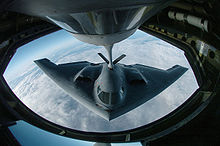 Airplane Picture - A B-2 during aerial refueling which extends its range past 6,000 miles to support intercontinental sorties.