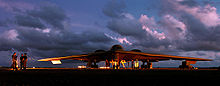 Airplane Picture - An Air Force maintenance crew services a B-2 at Andersen AFB, Guam, 2004