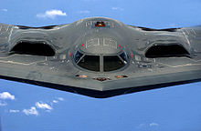 Airplane Picture - The B-2's engines are buried within its wing to conceal the induction fans and minimize their exhaust signature. The crew of two sit side-by-side in the cockpit.